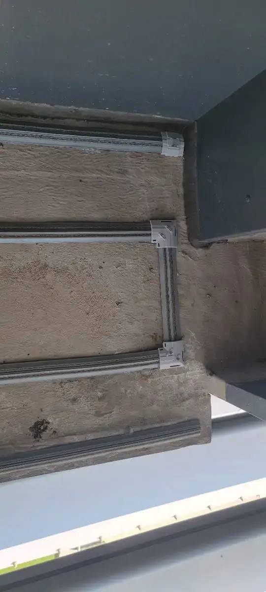 low-profile shock track bird deterrent on a building surface for Shock Track Photos