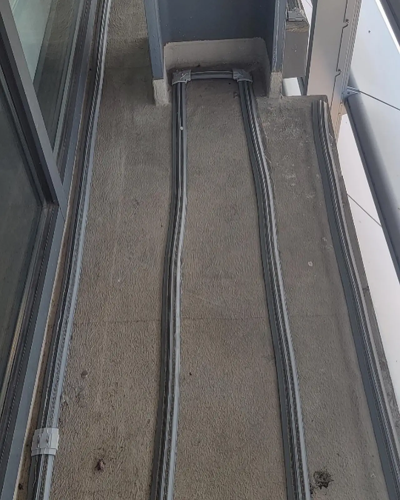 low-profile shock track bird deterrent on a building surface for Shock Track Photos