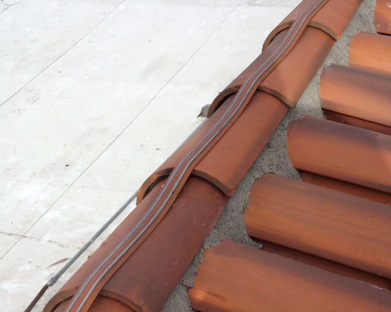 low-profile shock track bird deterrent on a building surface for Shock Track Photos